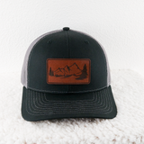 Black and Grey Richardson Trucker Hat With Mountain Landscap